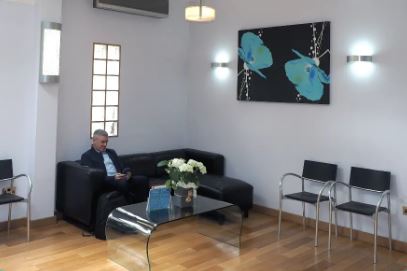 The calm, welcoming waiting room at Dental Wellbeing in Iver
